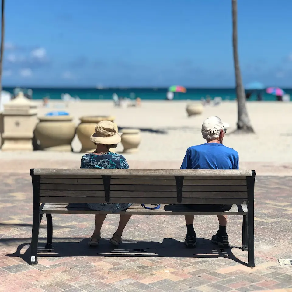 image of a couple sitting on a bench